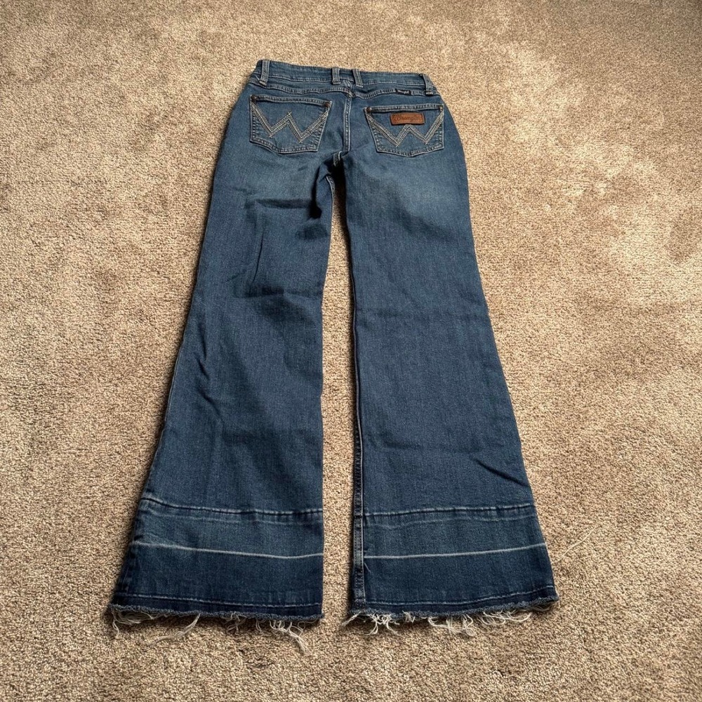 WRANGLER LOW RISE BOOTCUT RAW HEM DENIM